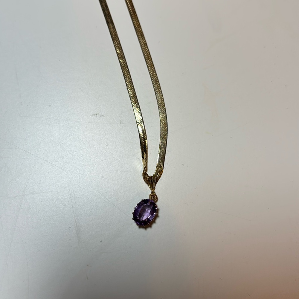 Gold and amythest necklacece